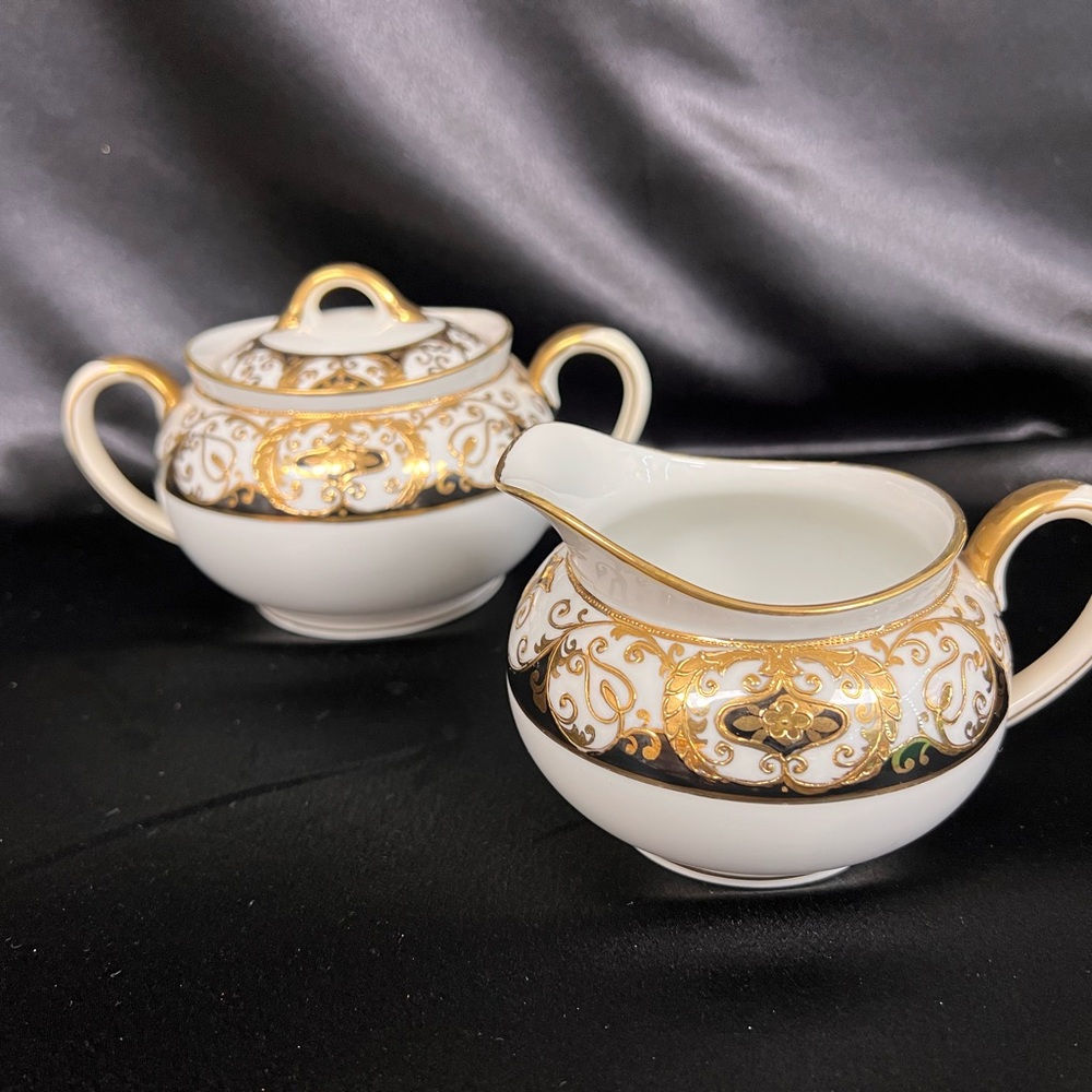 Noritake Gold and White Serveware Set with Intricate Design